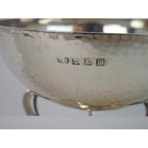 701 - AN ARTS AND CRAFT HAMMERED SILVER BOWL BY JAMES WEIR