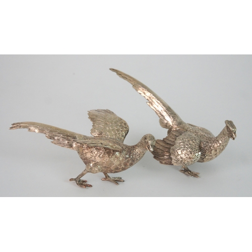 716 - A PAIR OF CONTINENTAL SILVER FIGURES OF COCK AND HEN PHEASANTS