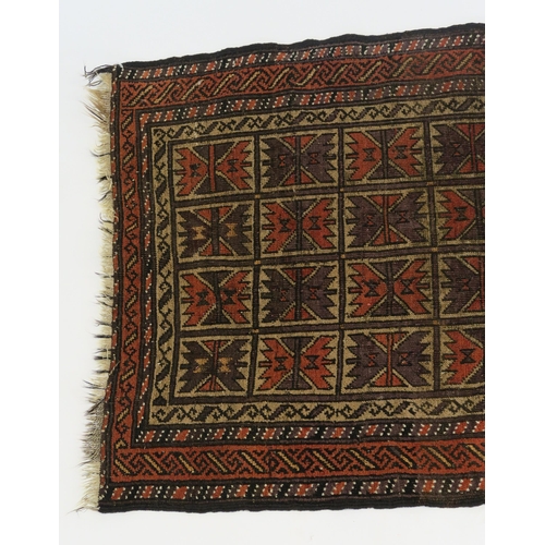 100 - AN EASTERN RUG WITH SMALL MULTI PANELS WITH GEOMETRIC DESIGN