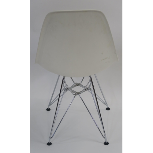 107 - A WHITE LEATHER LOUNGE CHAIR ON STEEL BASE