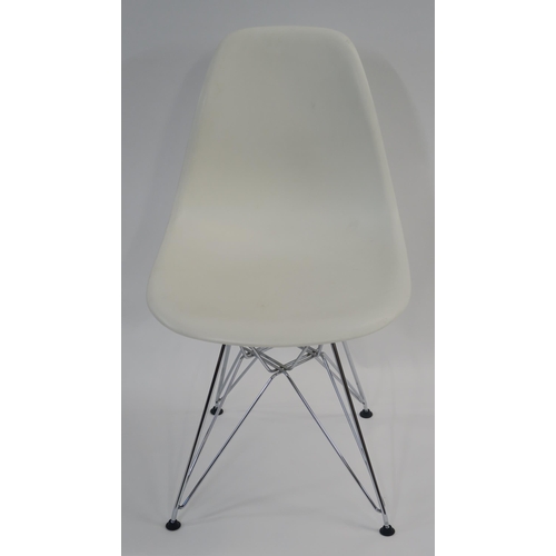 107 - A WHITE LEATHER LOUNGE CHAIR ON STEEL BASE