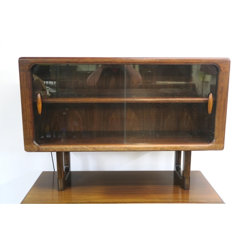 108 - A DYRLUND ROSEWOOD CREDENZA WITH TAMBOUR FRONT ON PLINTH BASE