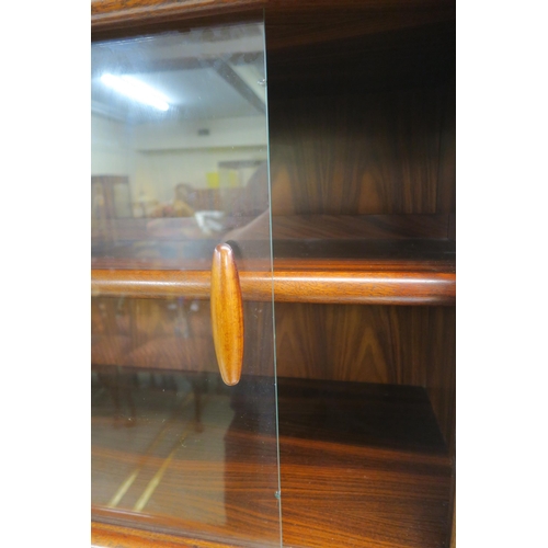 108 - A DYRLUND ROSEWOOD CREDENZA WITH TAMBOUR FRONT ON PLINTH BASE