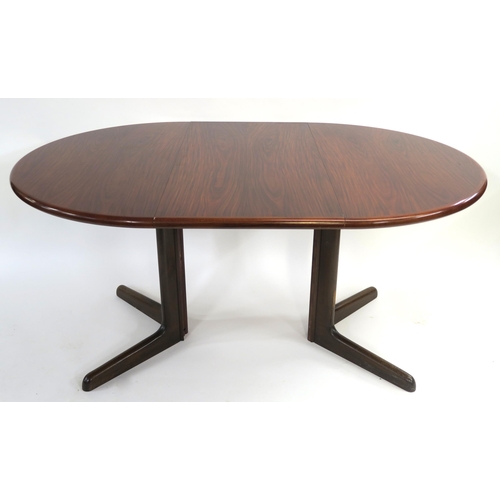 110 - A NIELS OTTO MOLLER FOR GUDME MOBELFABRIK ROSEWOOD EXTENDING DINING TABLE