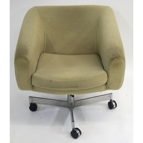 111 - A MID CENTURY SWIVEL RECLINER UPHOLSTERED CHAIR