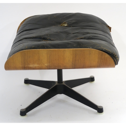 120 - A RAY AND CHARLES EAMES ROSEWOOD VENEERED PLYWOOD LOUNGE CHAIR 78cm high WITH MATCHING STOOL with or... 
