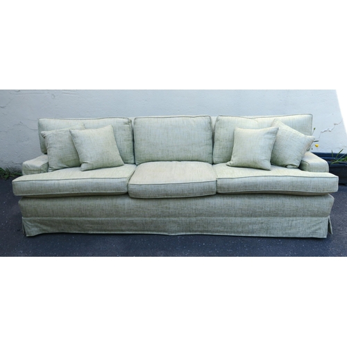 125 - A PETER DUDGEON LARGE GREEN UPHOLSTERED SOFA