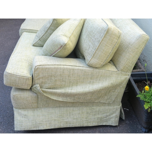 125 - A PETER DUDGEON LARGE GREEN UPHOLSTERED SOFA