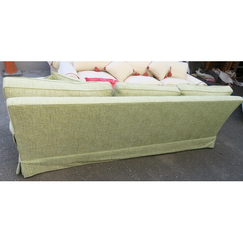 125 - A PETER DUDGEON LARGE GREEN UPHOLSTERED SOFA