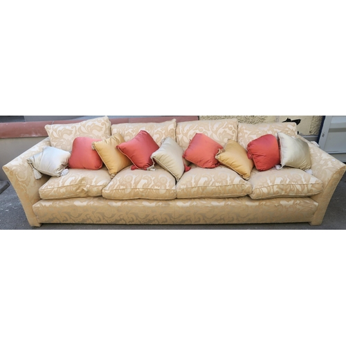 128 - A VERY LARGE CREAM SOFA