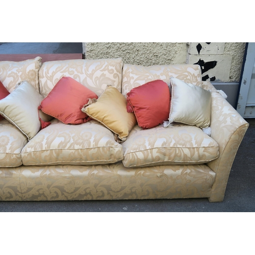 128 - A VERY LARGE CREAM SOFA