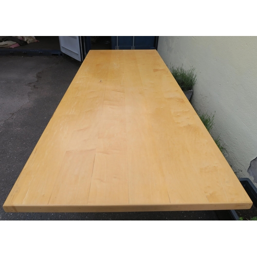 129 - A LARGE BESPOKE DINING TABLE WITH WAVY EDGE SUPPORTS AND SINGLE STRETCHER