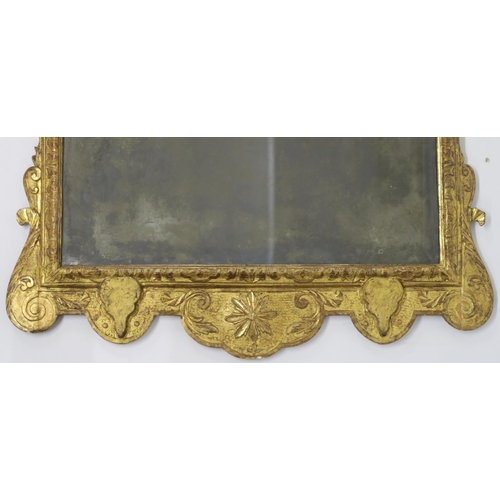 27 - A GEORGE II GILTWOOD AND GESSO WALL MIRROR