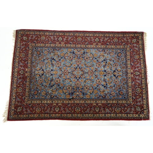 83 - A LIGHT BLUE GROUND ISFAHAN RUG