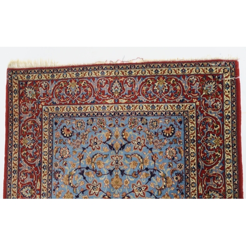 83 - A LIGHT BLUE GROUND ISFAHAN RUG