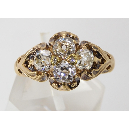 670 - AN ART NOUVEAU DIAMOND RINGthe yellow metal mount with chased foliate design is set with estimated a... 