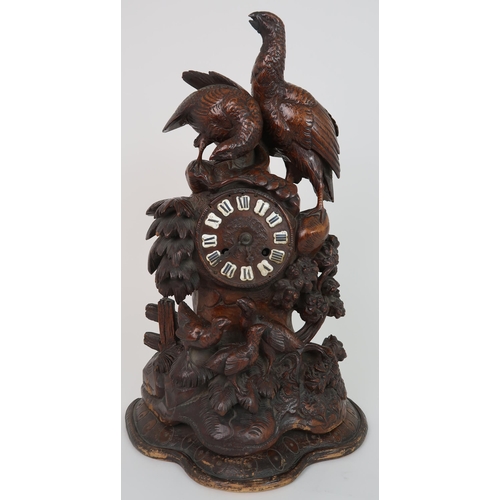 251 - A LATE 19TH CENTURY BLACK FOREST CLOCK