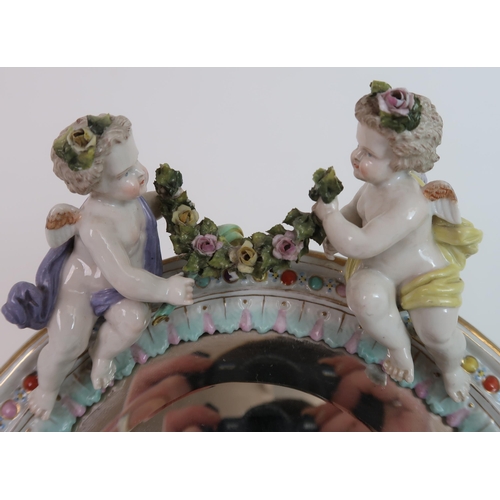 263 - A CONTINENTAL MEISSEN STYLE OVAL DRESSING TABLE MIRROR