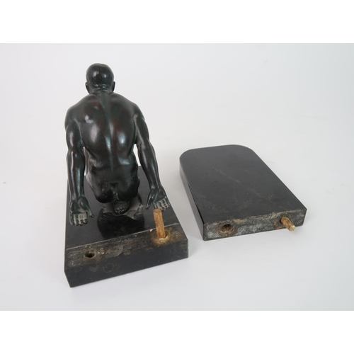 283 - A PAIR OF BRONZE BOOKENDS