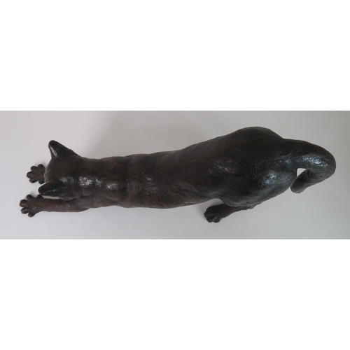 288 - A BRONZED SCULPTURE OF A STRETCHING CAT