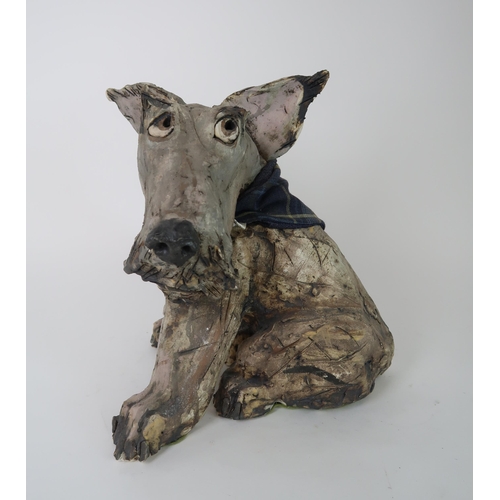 290 - OLIVIA BROWN - A CERAMIC SCULPTURE OF A TERRIER CROSS