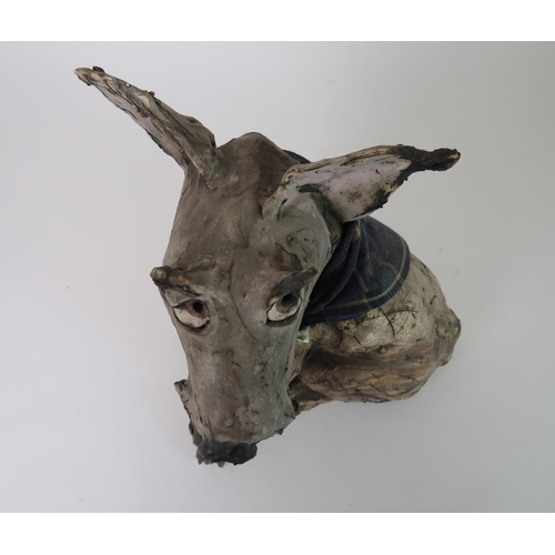 290 - OLIVIA BROWN - A CERAMIC SCULPTURE OF A TERRIER CROSS