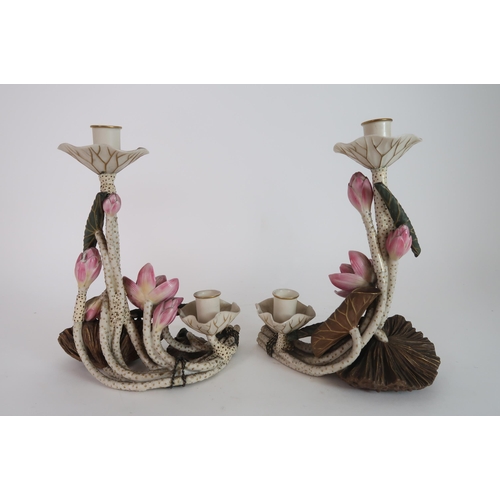 295 - A PAIR OF ROYAL WORCESTER LOTUS CANDLEHOLDERS