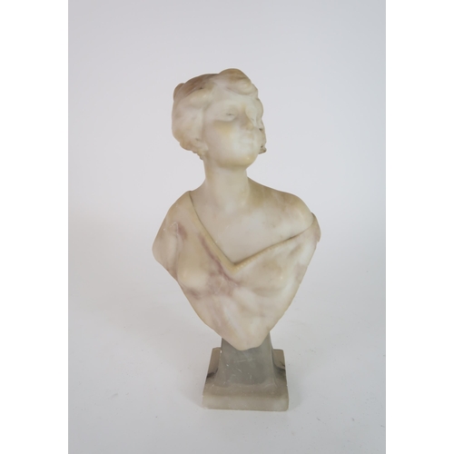 310 - AN ALABASTER BUST OF A YOUNG WOMAN