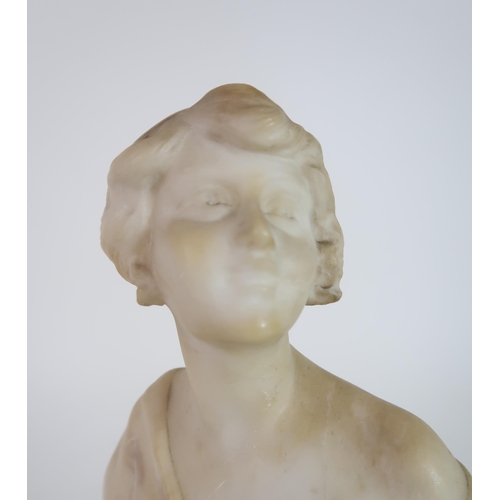 310 - AN ALABASTER BUST OF A YOUNG WOMAN