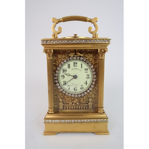 321 - A FRENCH GILDED METAL AND PASTE SET REPEATER CARRIAGE CLOCK