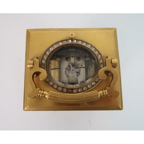 321 - A FRENCH GILDED METAL AND PASTE SET REPEATER CARRIAGE CLOCK