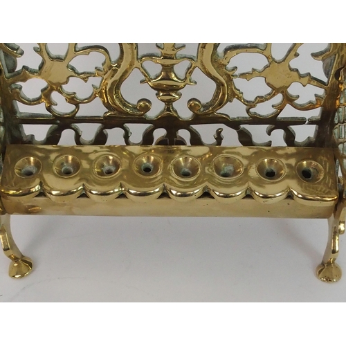 382 - A BRASS HANUKKAH WITH PIERCED BACK PLATE