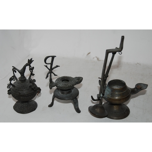 417 - A BRONZE OIL LAMP