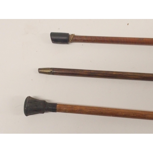 447 - THREE VARIOUS GOLF WALKING STICK