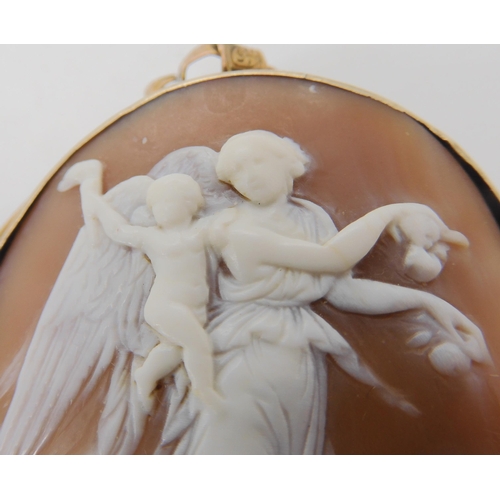 509 - A YELLOW METAL MOUNTED LARGE SHELL CAMEO