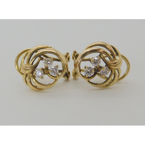 519 - A PAIR OF 9CT GOLD AND DIAMOND EARRINGS