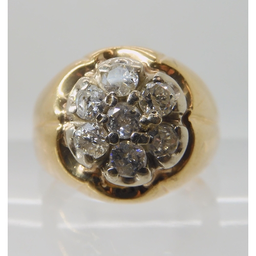 525 - A 10K GOLD GENTS DIAMOND FLOWER CLUSTER RING