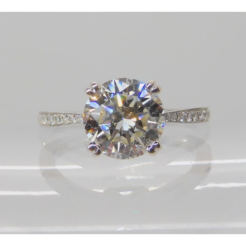 527 - AN 18CT WHITE GOLD DIAMOND SOLITAIRE RING