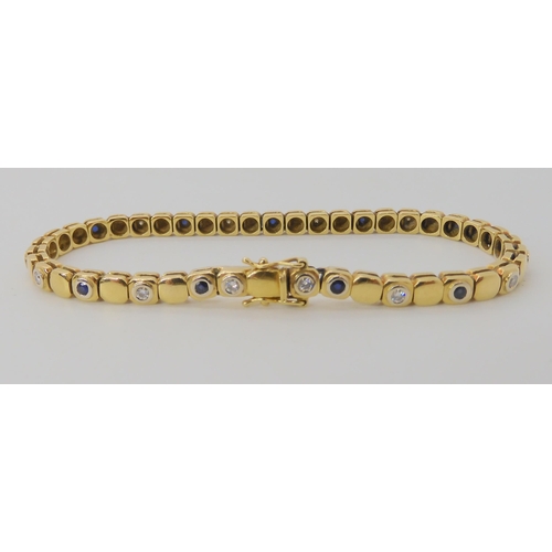 533 - AN 18CT GOLD SAPPHIRE AND DIAMOND BRACELET