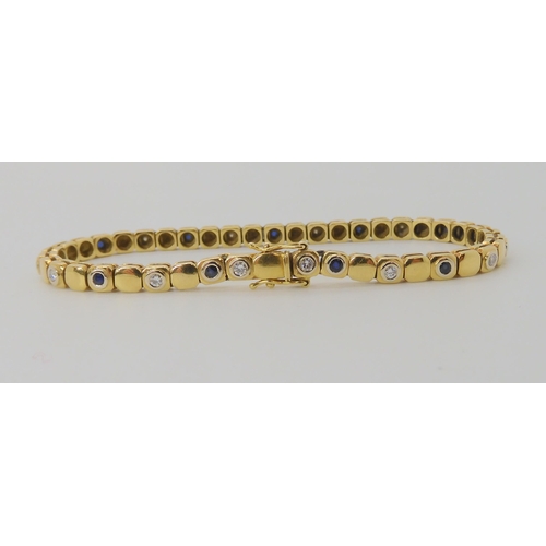 533 - AN 18CT GOLD SAPPHIRE AND DIAMOND BRACELET