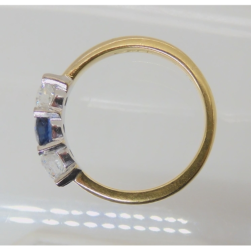 536 - AN 18CT GOLD SAPPHIRE AND DIAMOND THREE STONE RING