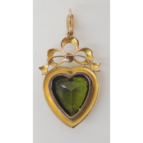 542 - A BRIGHT YELLOW METAL PEARL HEART SHAPED PENDANT