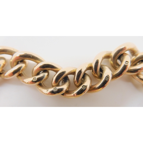 547 - A 9CT GOLD CURB LINK BRACELET OF SOLID CONSTRUCTION