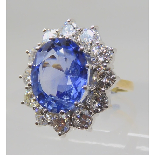 552 - A SUBSTANTIAL SAPPHIRE AND DIAMOND RING