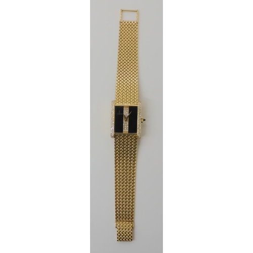 668 - AN 18CT GOLD  ONYX AND DIAMOND CORUM WRISTWATCH