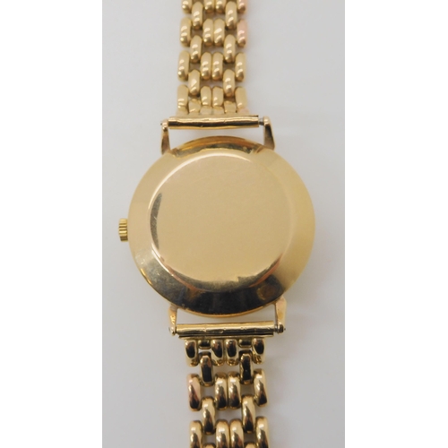 674 - A 9CT GOLD OMEGA AUTOMATIC WRISTWATCH