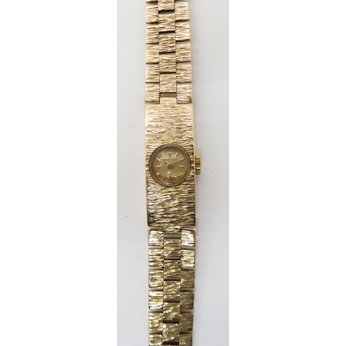 688 - A RETRO 9CT GOLD LADIES BUECHE GIROD WRISTWATCH