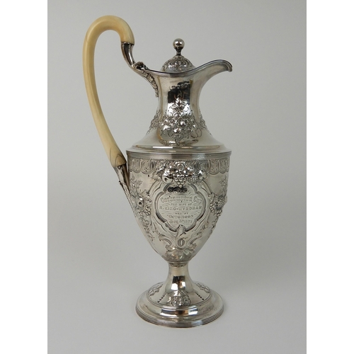 691 - A SILVER TROPHY EWER