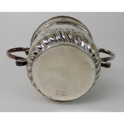 693 - AN EARLY 18TH CENTURY SILVER PORRINGER