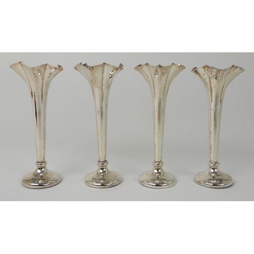 695 - A CASED SET OF FOUR SILVER FLOWER FLUTES